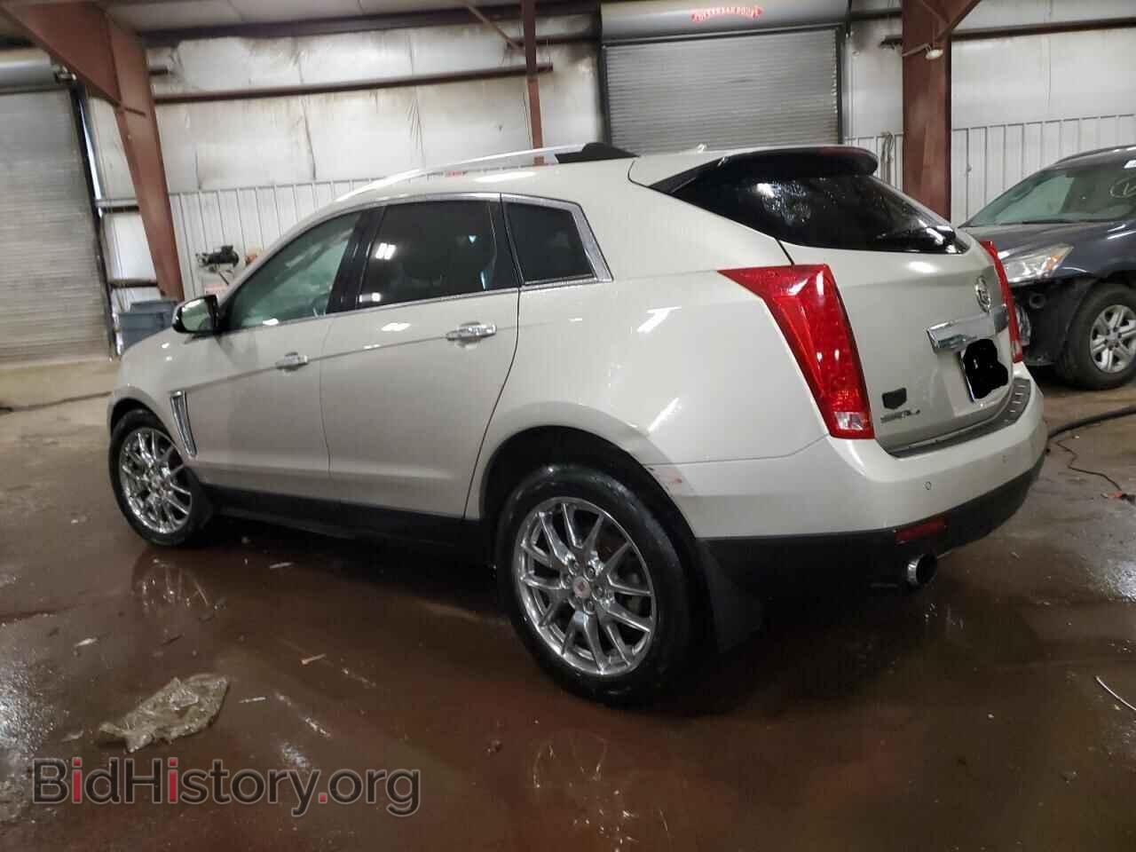 2014 CADILLAC SRX - VIN: 3GYFNFE37ES559315 - Фото 2