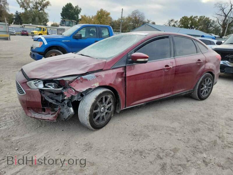 2015 Ford FOCUS SE (VIN 1FADP3F2XFL255811) — photo 1 of 14, Copart, damage: front end