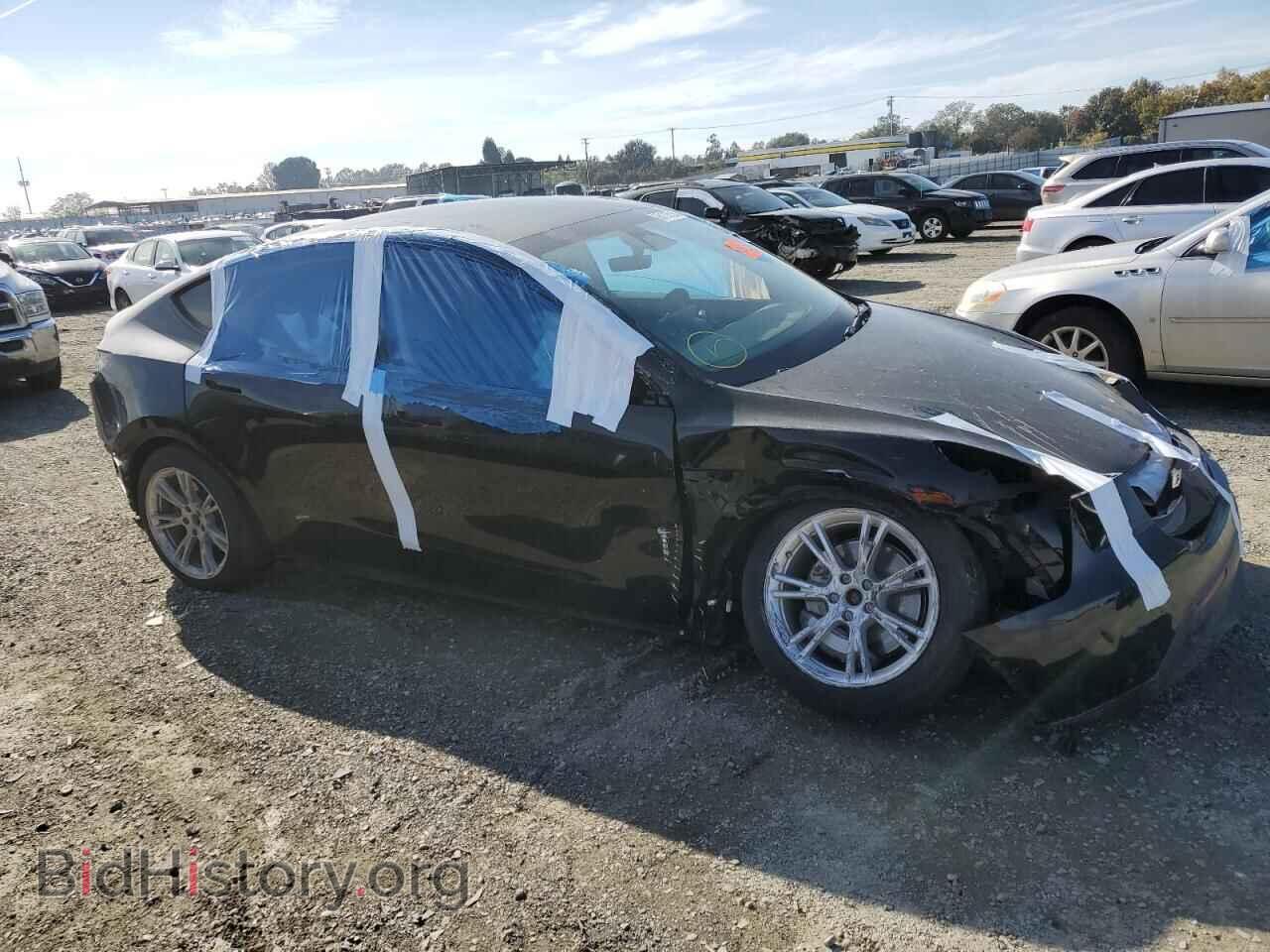 2023 TESLA MODEL Y - VIN: 7SAYGDEE7PF748608 - Photo 4