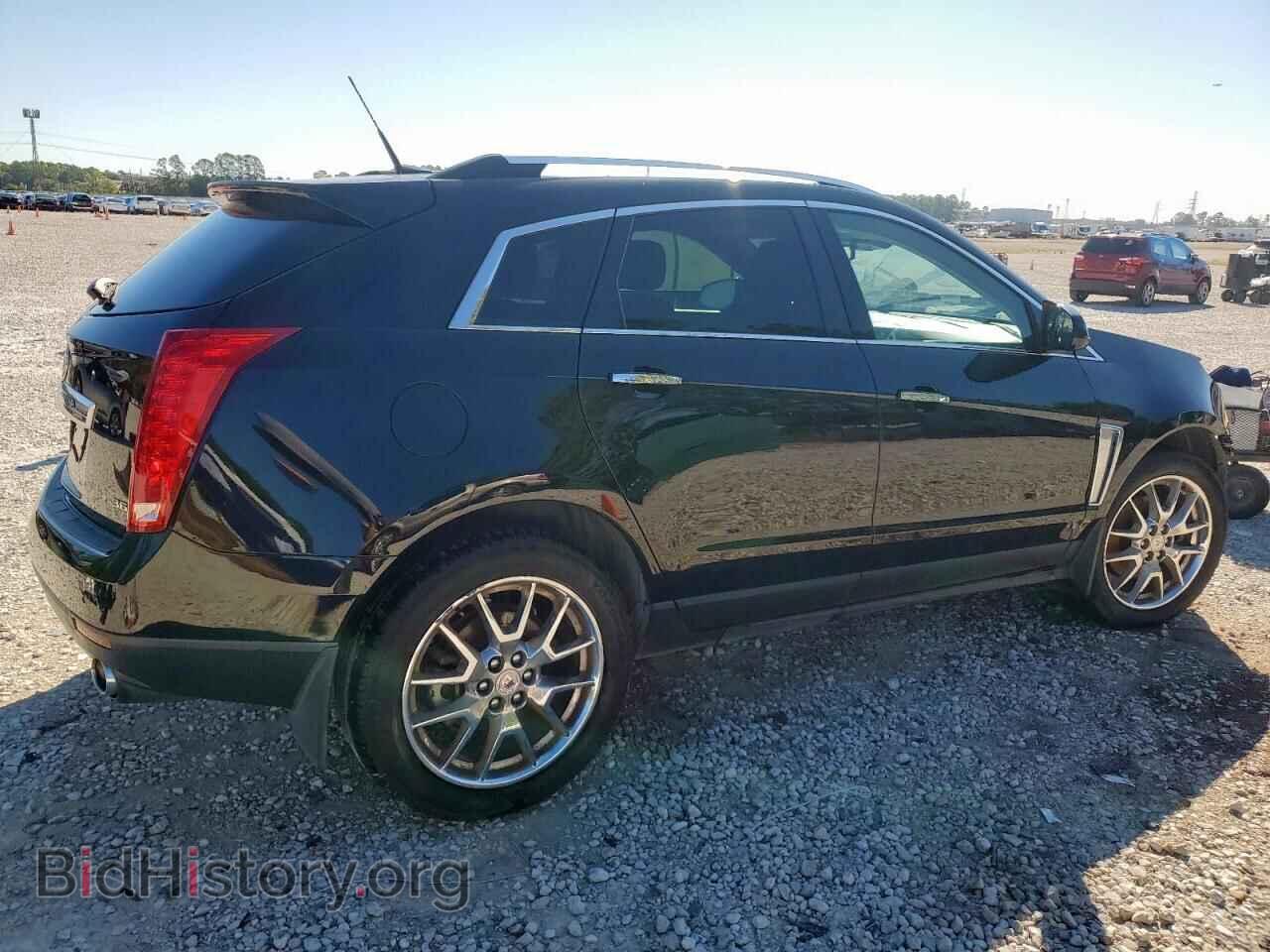 2014 CADILLAC SRX - VIN: 3GYFNDE3XES658845 - Фото 3