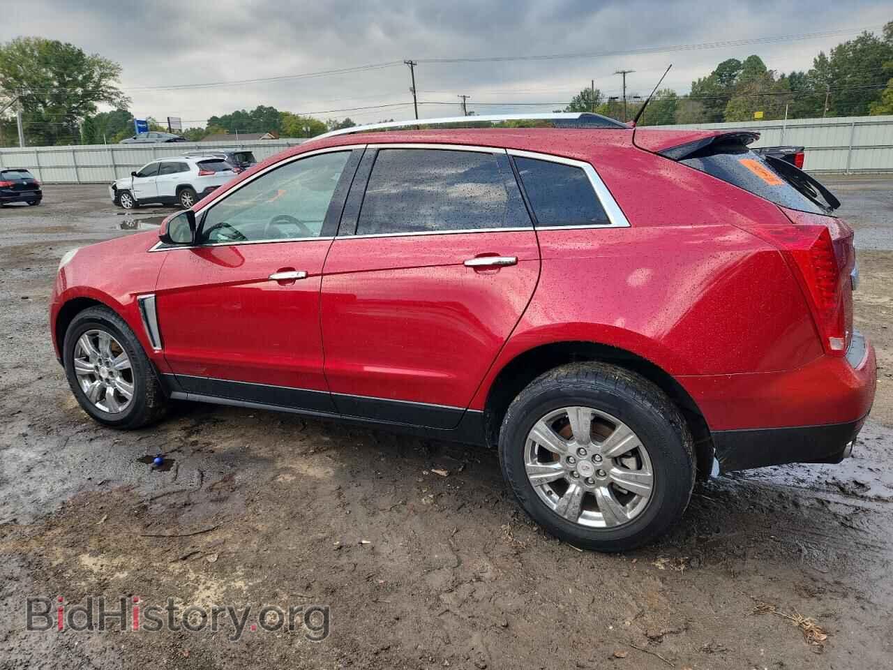 2014 CADILLAC SRX - VIN: 3GYFNBE37ES676840 - Фото 2