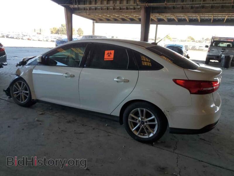 2016 Ford FOCUS (VIN 1FADP3F21GL264205) — фото 2 из 13