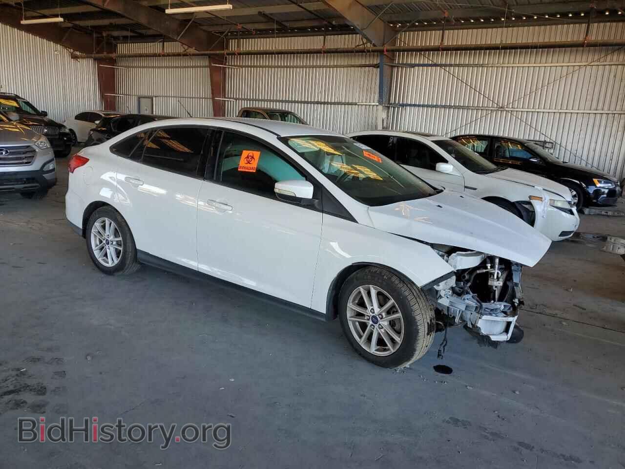 2016 FORD FOCUS - VIN: 1FADP3F21GL264205 - Photo 4
