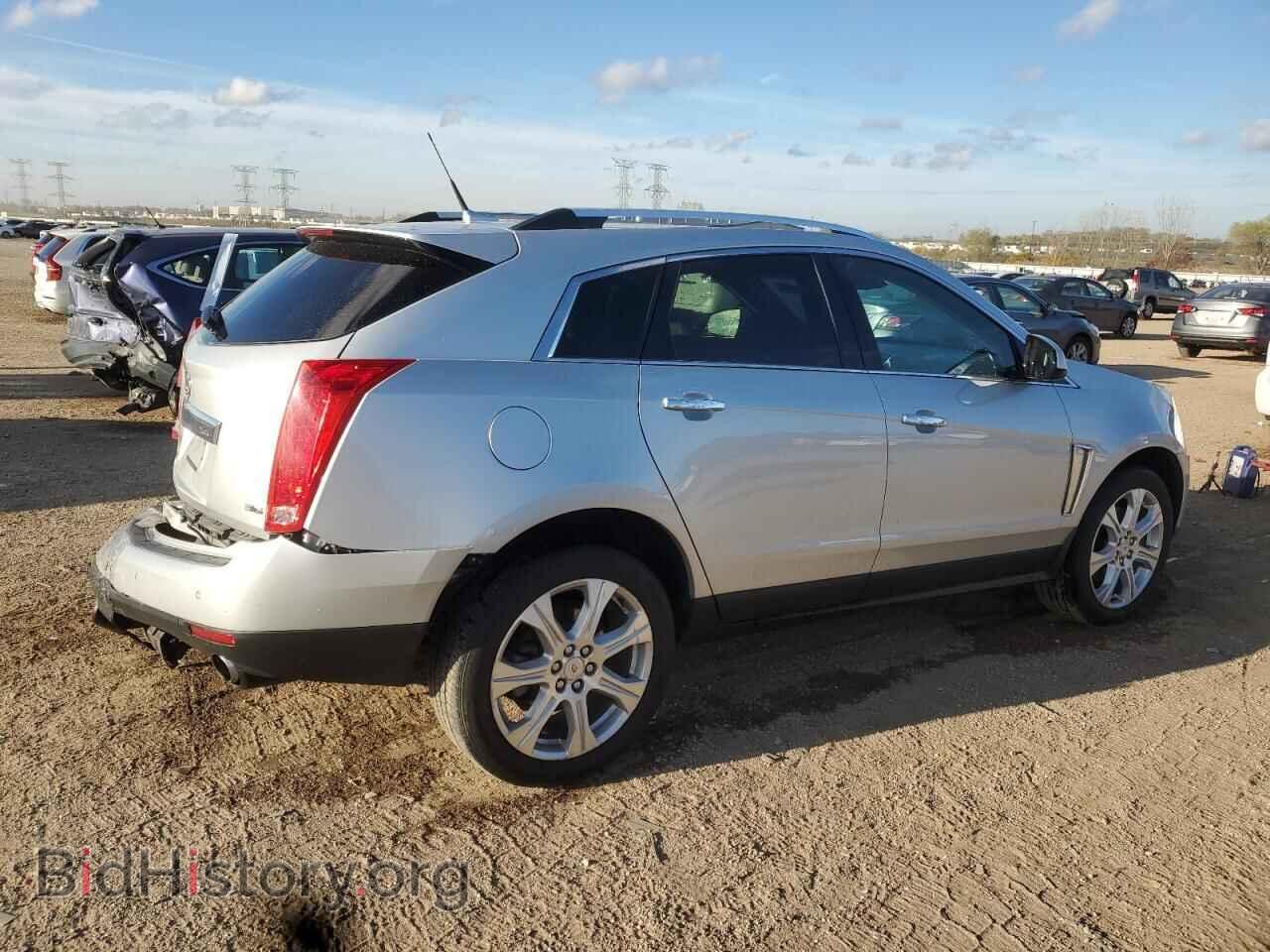 2014 CADILLAC SRX - VIN: 3GYFNDE37ES533141 - Фото 3