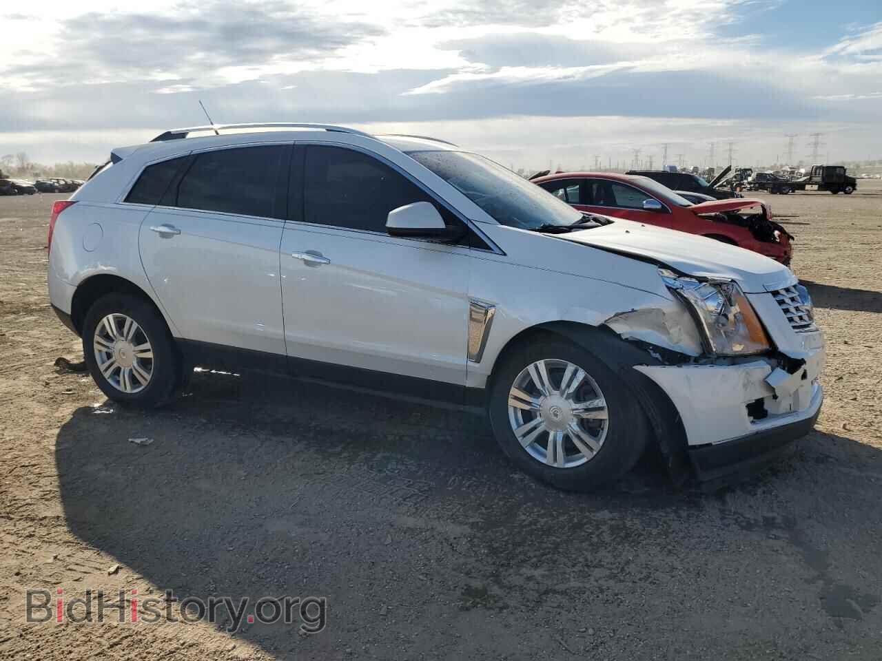 2014 CADILLAC SRX - VIN: 3GYFNEE33ES570225 - Фото 4