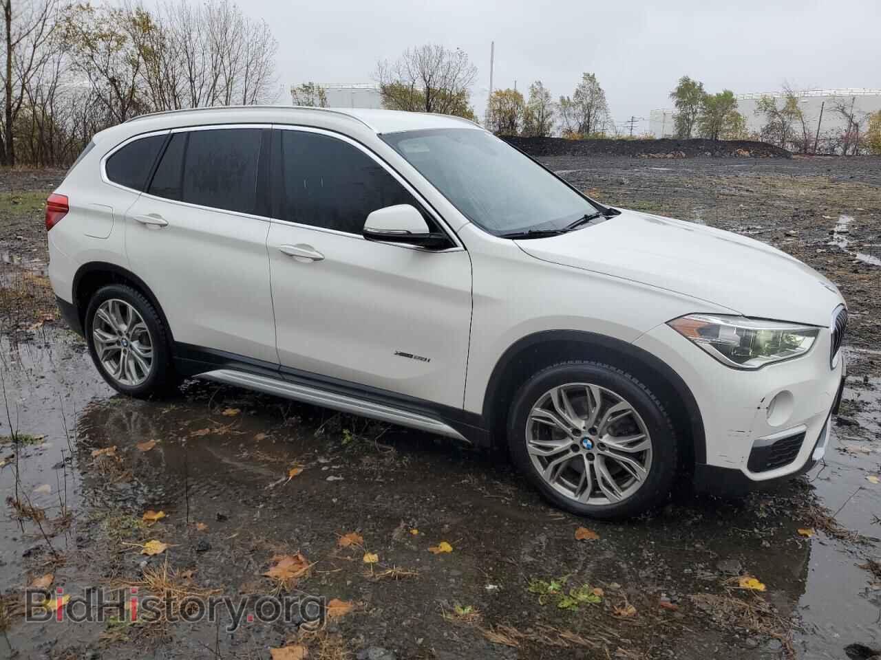 2017 BMW X1 - VIN: WBXHT3C32H5F80938 - Фото 4
