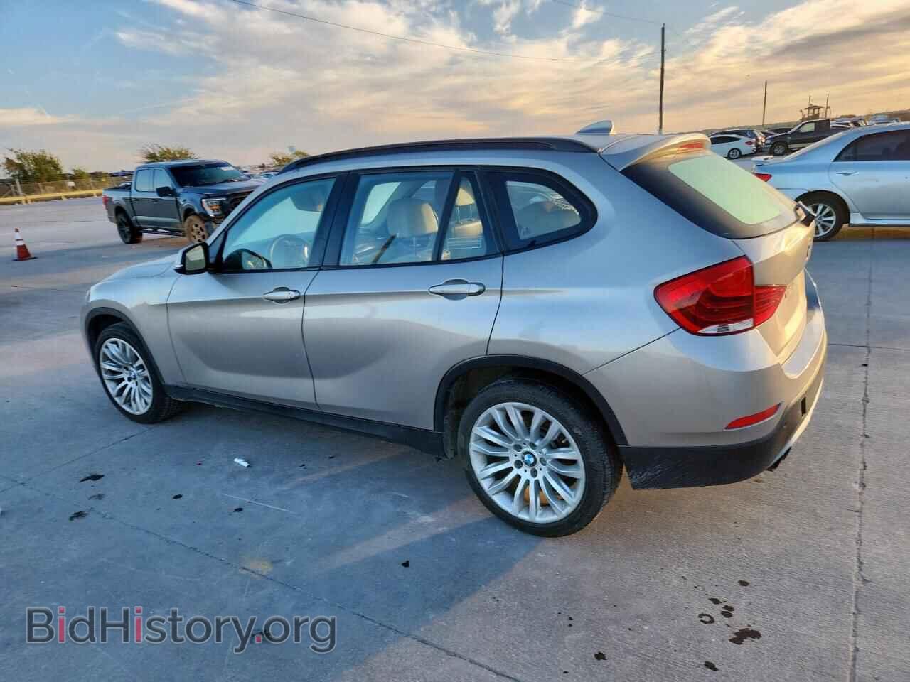 2014 BMW X1 - VIN: WBAVM1C5XEVW50985 - Фото 2
