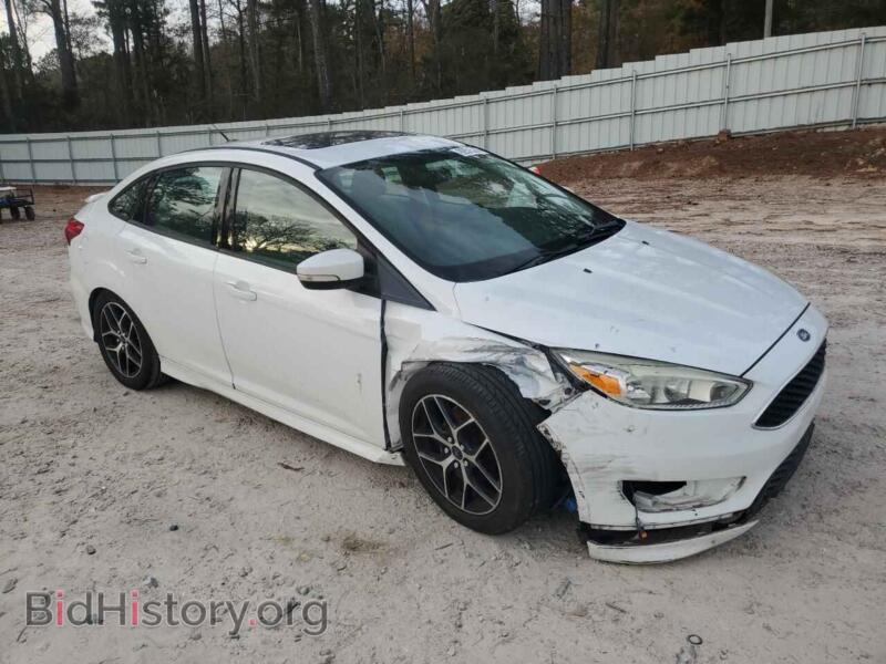 2015 Ford FOCUS (VIN 1FADP3FE0FL321499) — photo 4 of 13