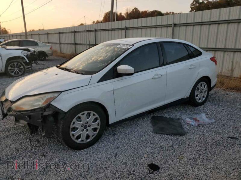 2012 Ford FOCUS SE (VIN 1FAHP3F2XCL380868) — photo 1 of 12, Copart, damage: front end