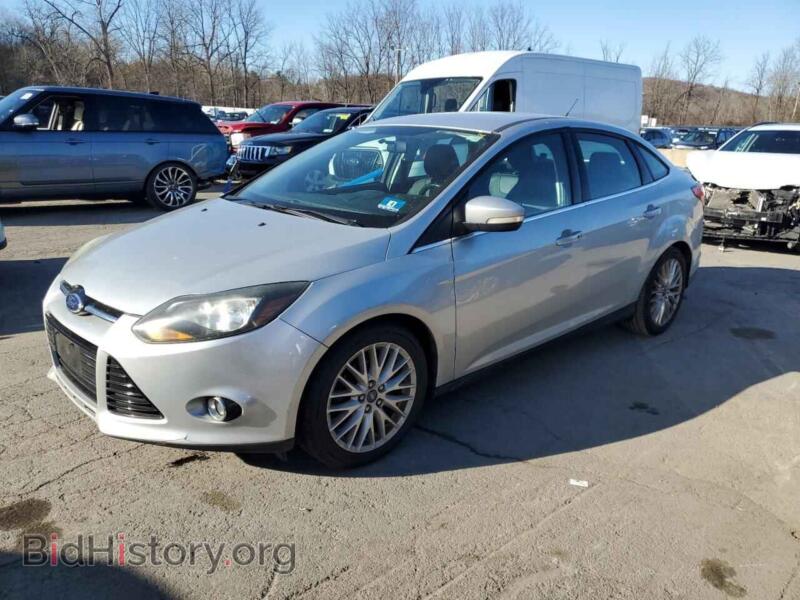 2014 Ford FOCUS Titanium (VIN 1FADP3J26EL232340) — фото 1 из 12, Copart, повреждение: передняя часть