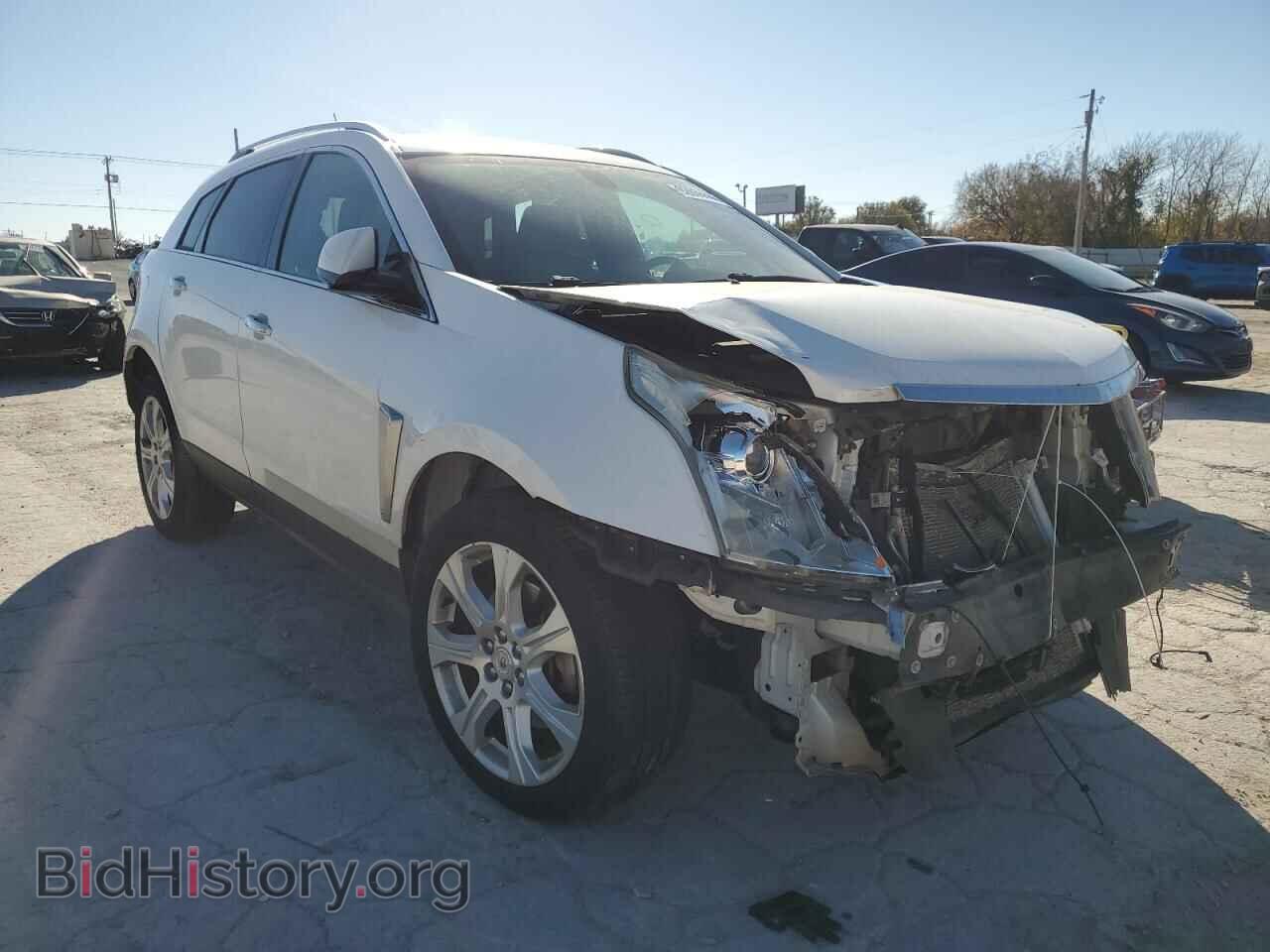 2014 CADILLAC SRX - VIN: 3GYFNCE37ES648462 - Photo 4