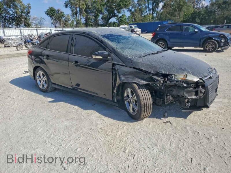 2014 Ford FOCUS (VIN 1FADP3F20EL165260) — photo 4 of 15