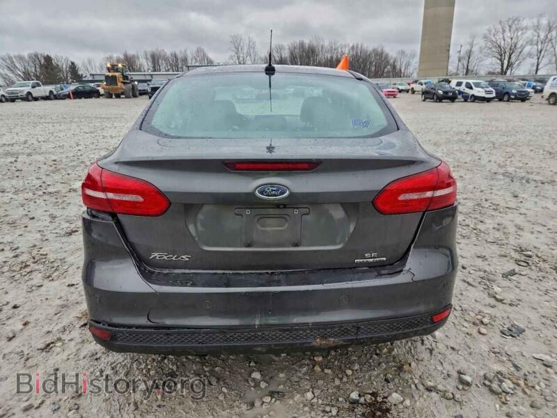 2016 Ford FOCUS (VIN 1FADP3F24GL220618) — фото 6 из 14