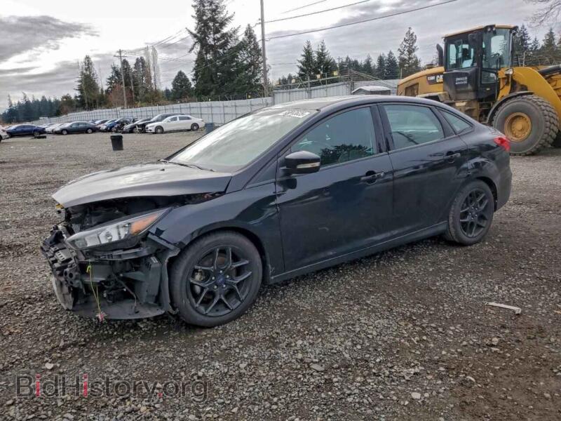 2016 Ford FOCUS SE (VIN 1FADP3F2XGL374606) — фото 1 из 13, Copart, повреждение: передняя часть