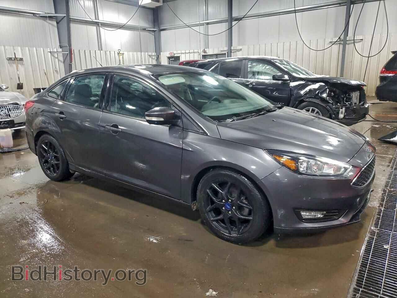 2016 FORD FOCUS - VIN: 1FADP3F22GL372557 - Фото 4