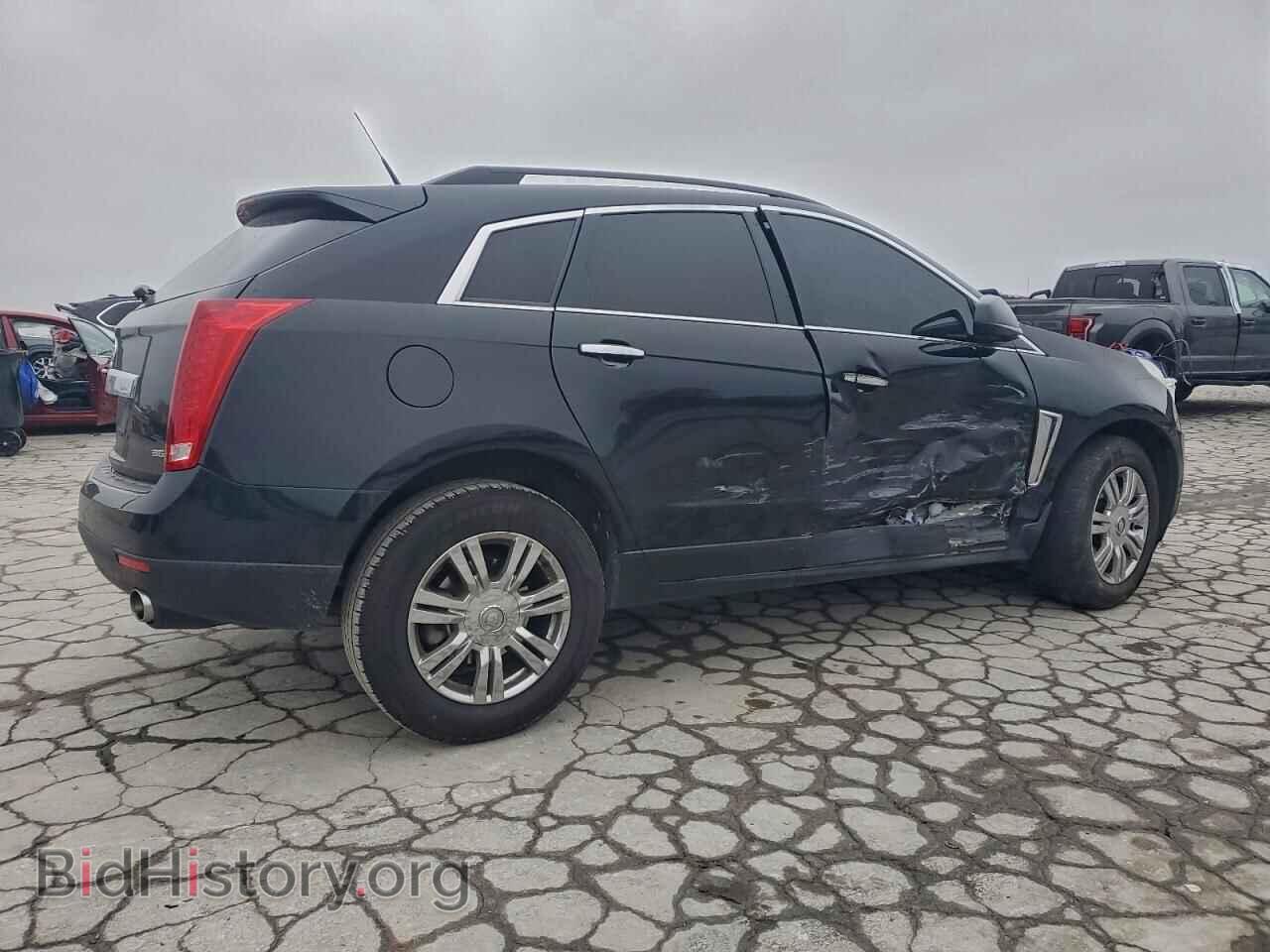 2013 CADILLAC SRX - VIN: 3GYFNAE3XDS541392 - Фото 3