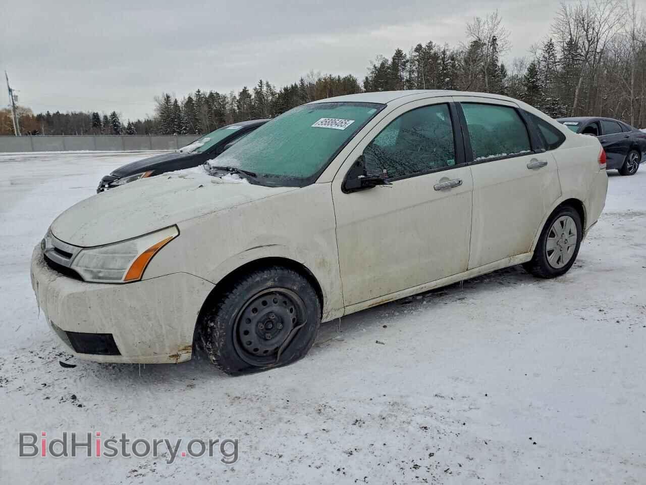 Фотография 1FAHP35N19W204195 - FORD FOCUS 2009
