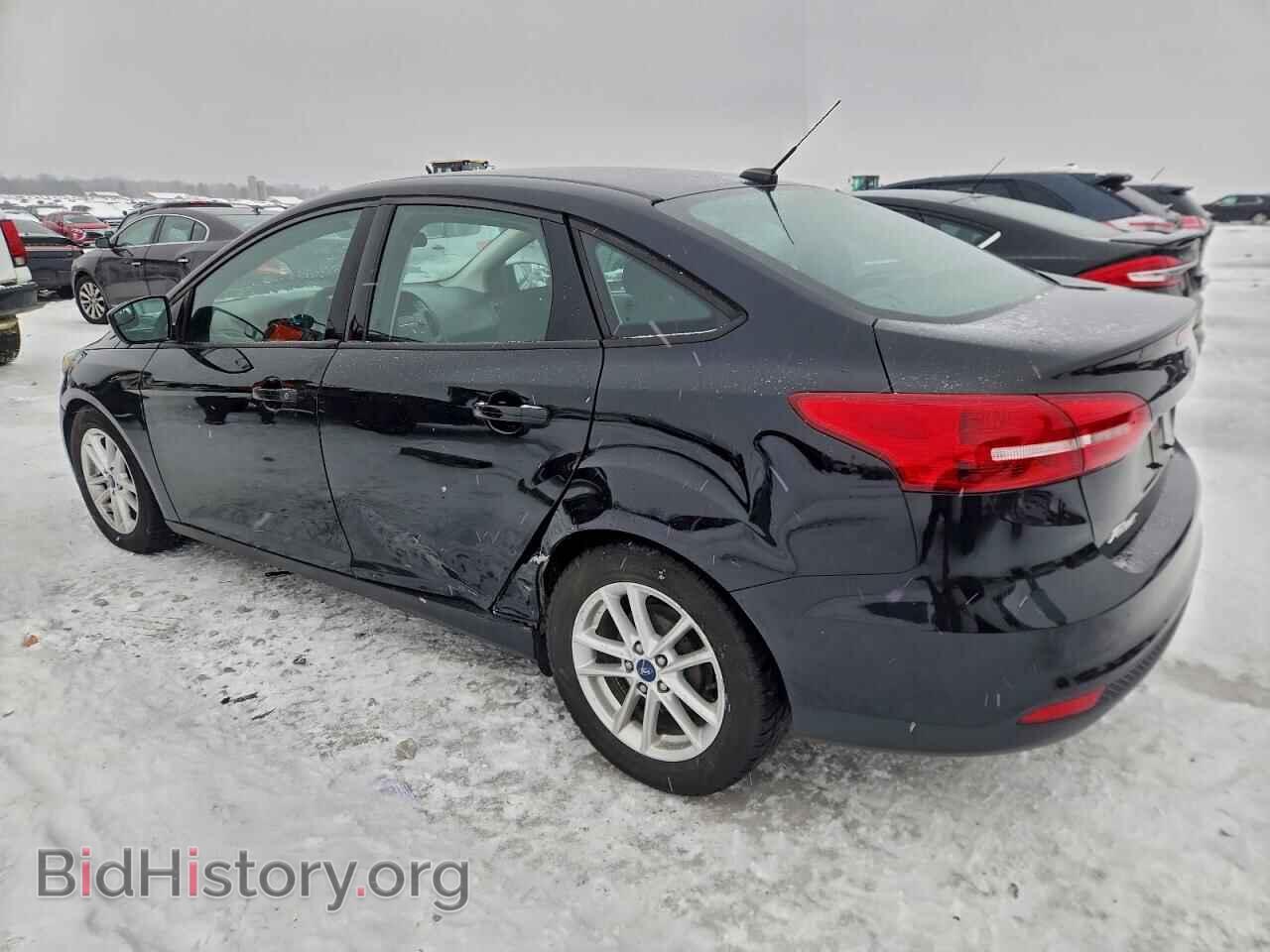 2016 FORD FOCUS - VIN: 1FADP3F22GL312374 - Фото 2