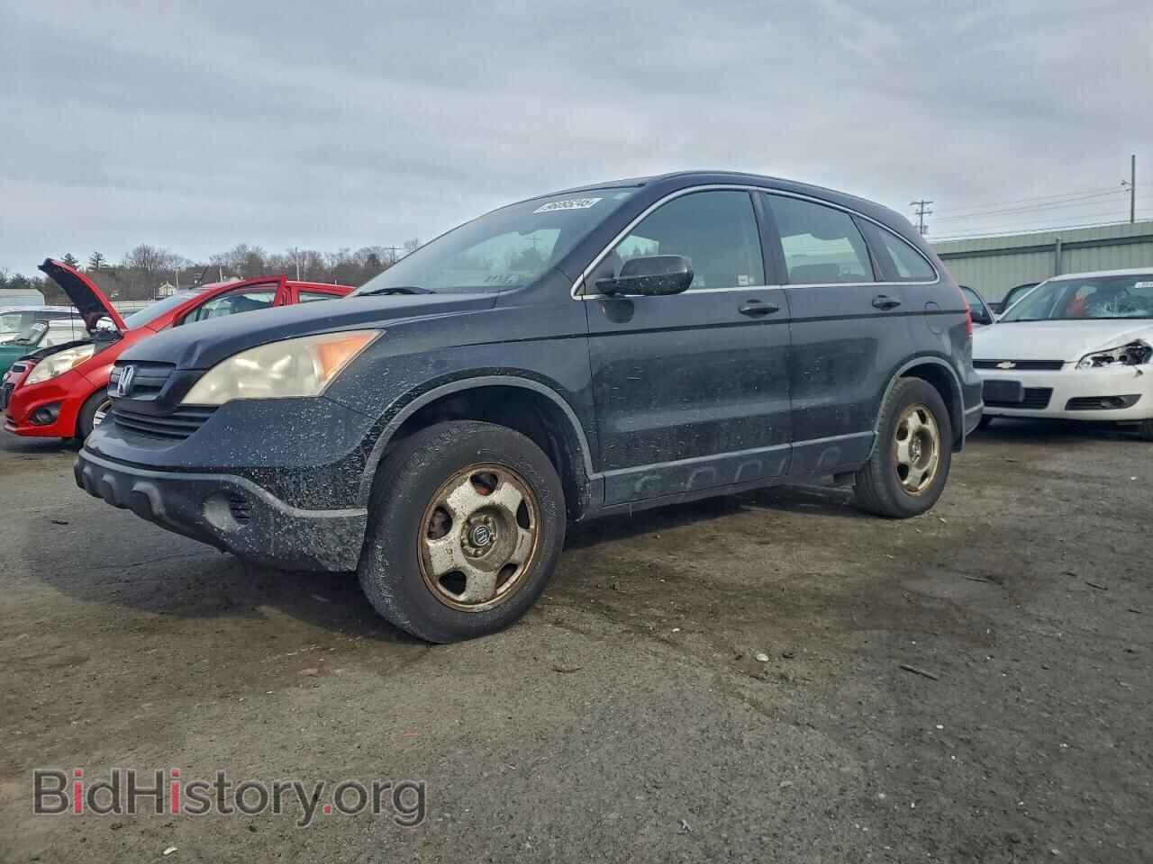 Photo JHLRE48367C028668 - HONDA CRV 2007
