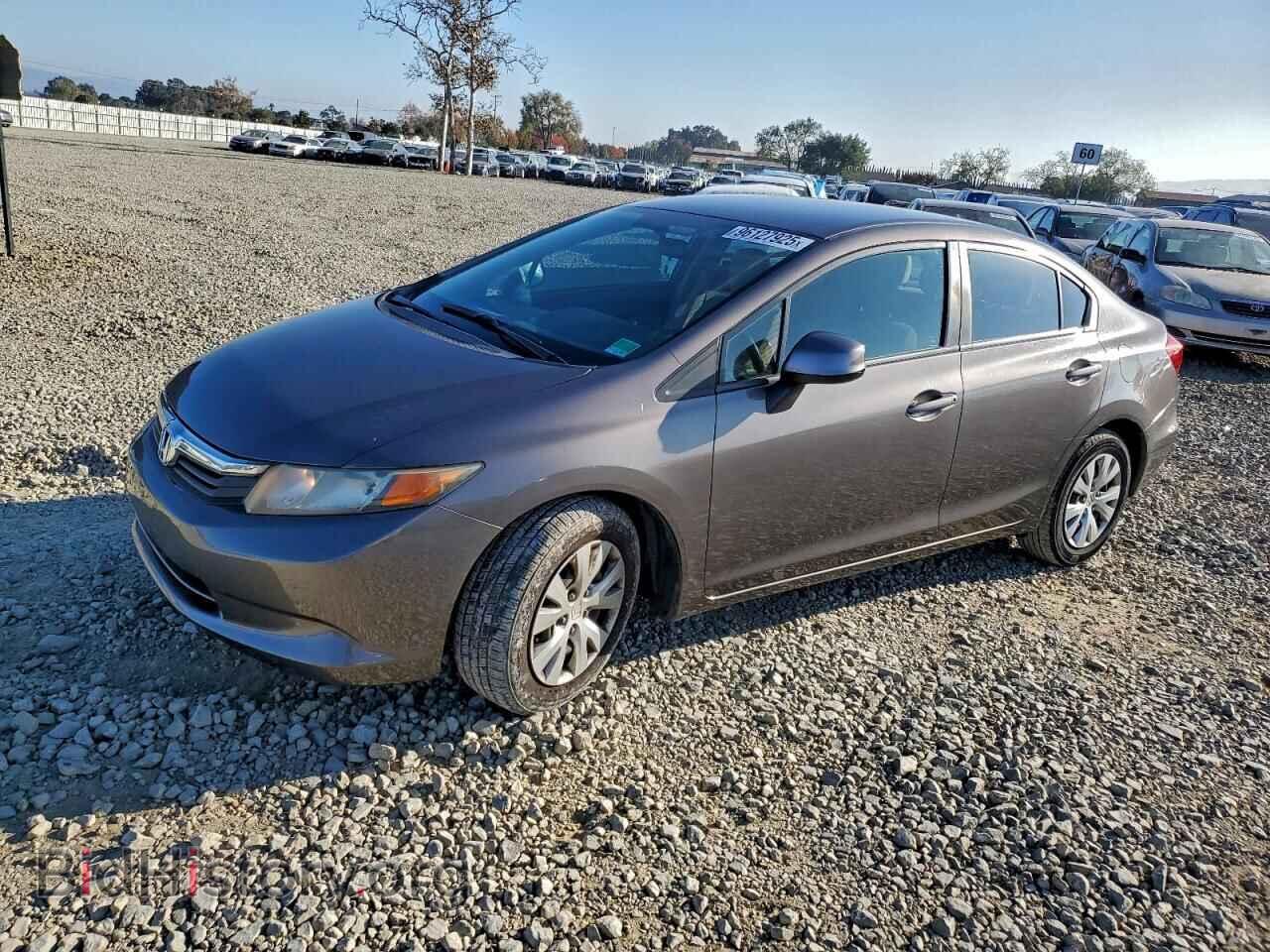 Фотография 19XFB2F54CE309954 - HONDA CIVIC 2012