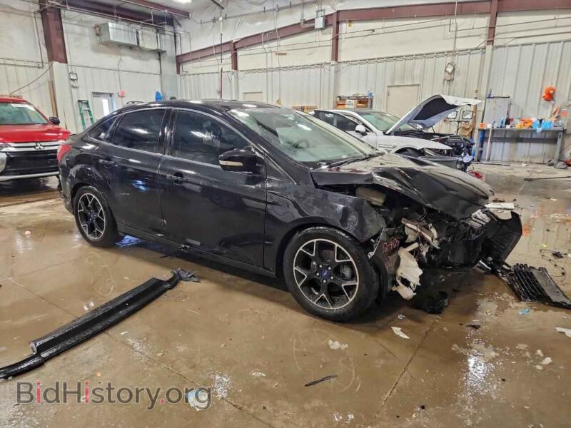 2014 Ford FOCUS (VIN 1FADP3F29EL153849) — photo 4 of 14