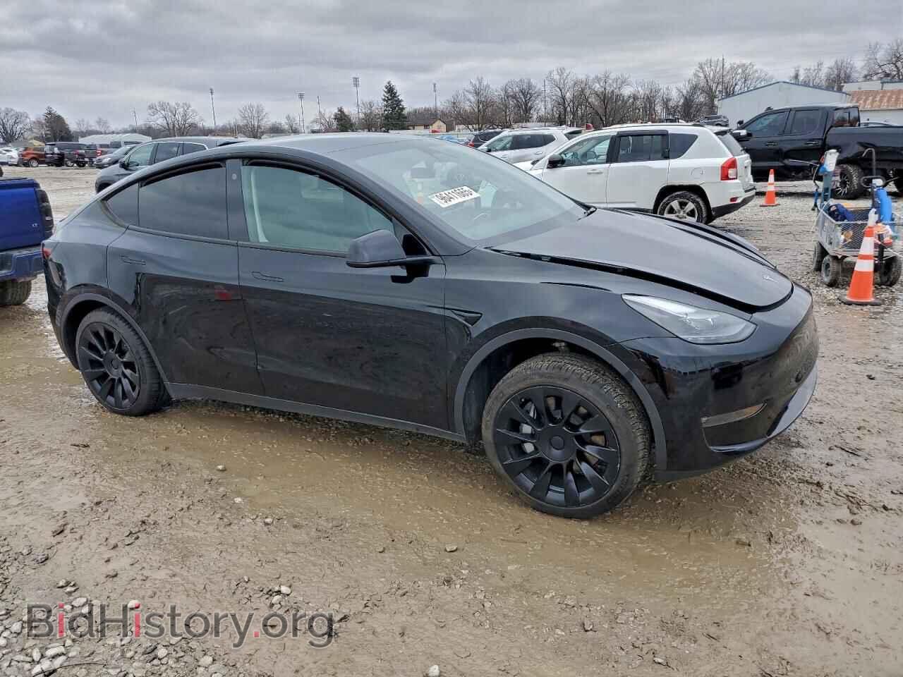 2023 TESLA MODEL Y - VIN: 7SAYGAEE3PF764416 - Photo 4