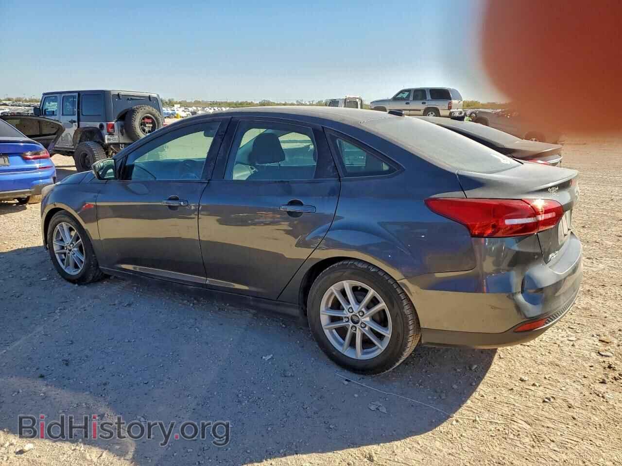 2016 FORD FOCUS - VIN: 1FADP3F23GL404562 - Фото 2