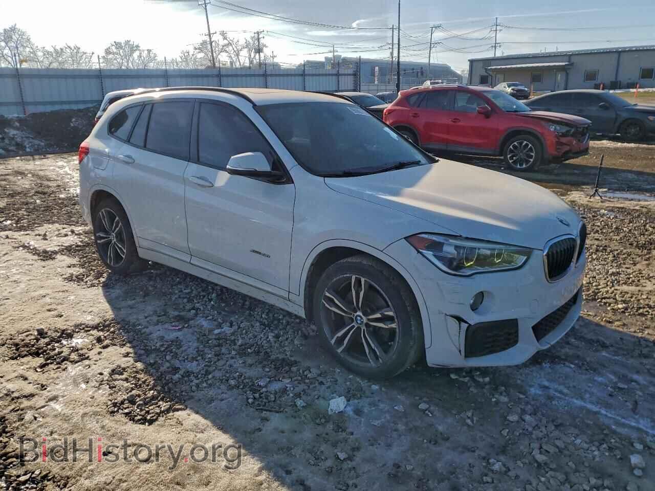2016 BMW X1 - VIN: WBXHT3C33G5E50911 - Фото 4
