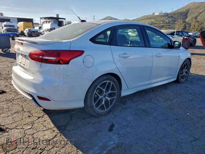 2016 Ford FOCUS (VIN 1FADP3F24GL238505) — photo 3 of 14