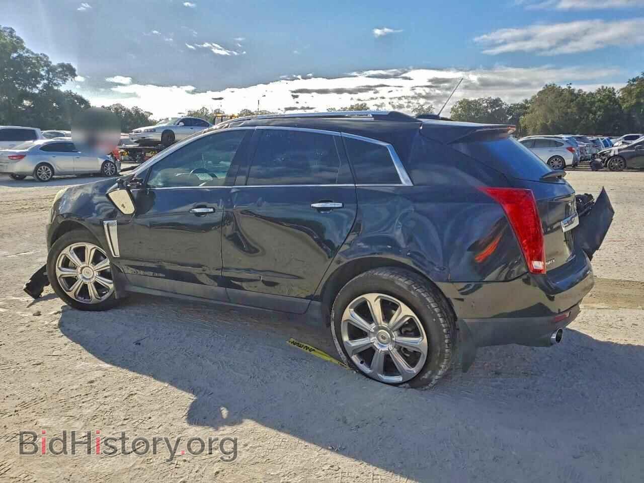 2016 CADILLAC SRX - VIN: 3GYFNCE33GS569938 - Фото 2