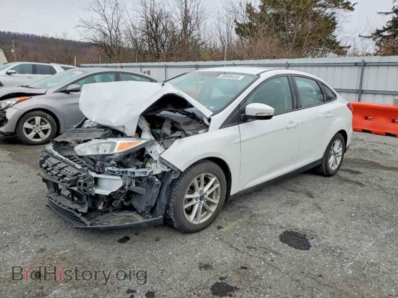 2015 Ford FOCUS SE (VIN 1FADP3F20FL206889) — photo 1 of 12, Copart, damage: front end