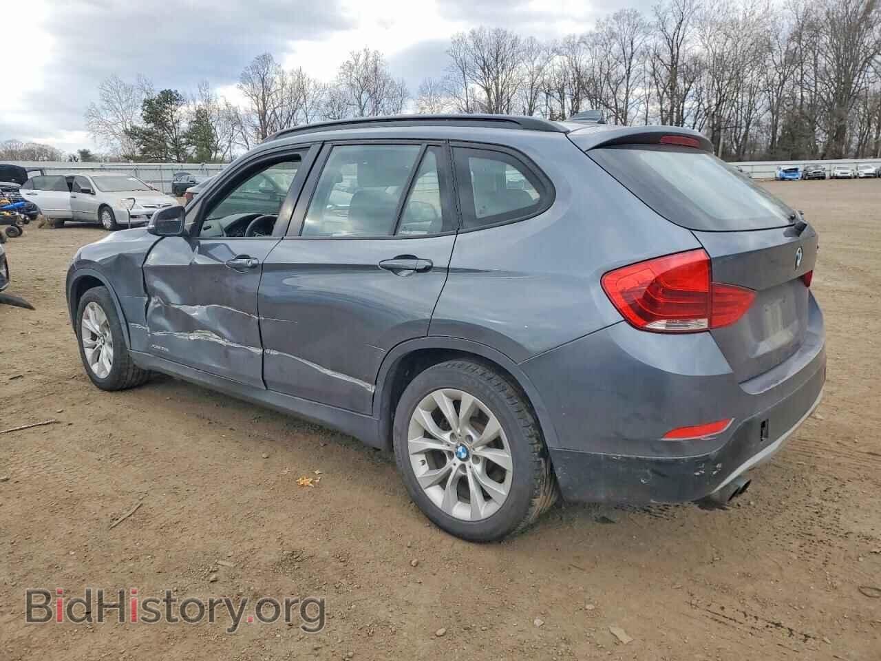 2014 BMW X1 - VIN: WBAVL1C59EVY20739 - Фото 2