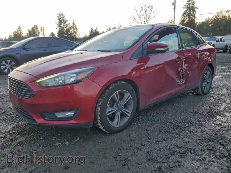 2017 Ford FOCUS SE (VIN 1FADP3FE8HL333550) — фото 1 из 12, Copart, повреждение: бок