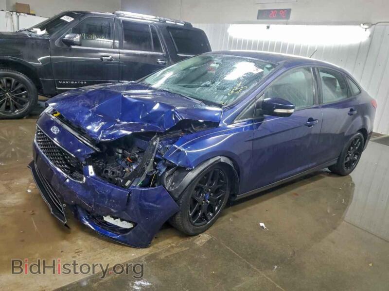 2016 Ford FOCUS SE (VIN 1FADP3F2XGL275042) — photo 1 of 13, Copart, damage: front end