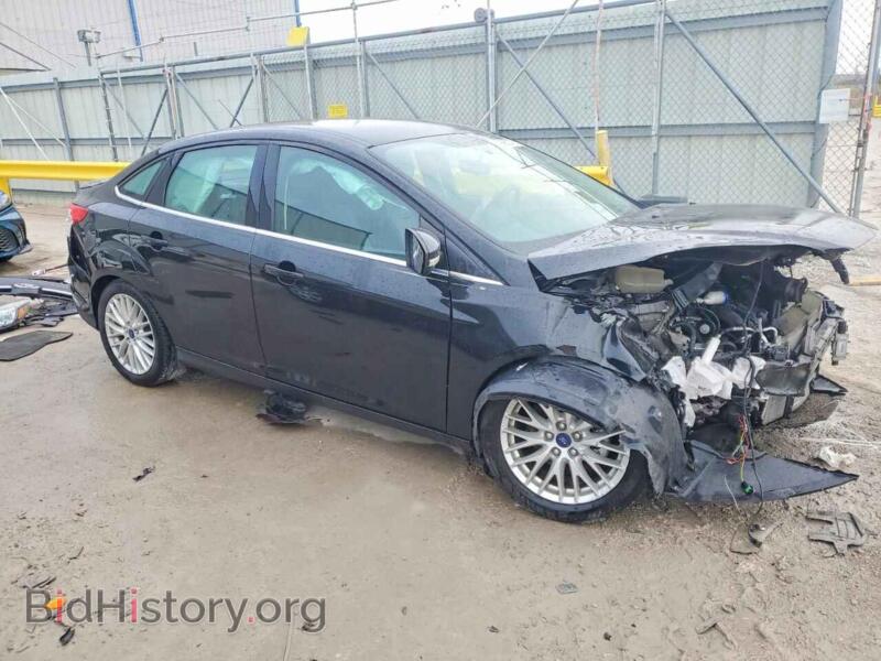 2014 Ford FOCUS (VIN 1FADP3J25EL235214) — photo 4 of 15