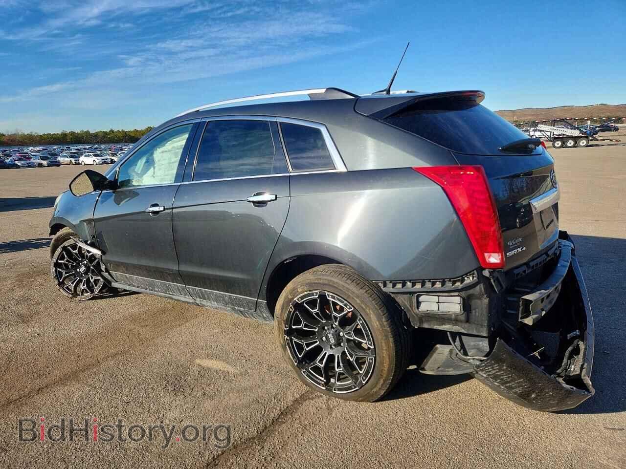 2014 CADILLAC SRX - VIN: 3GYFNFE34ES627828 - Фото 2