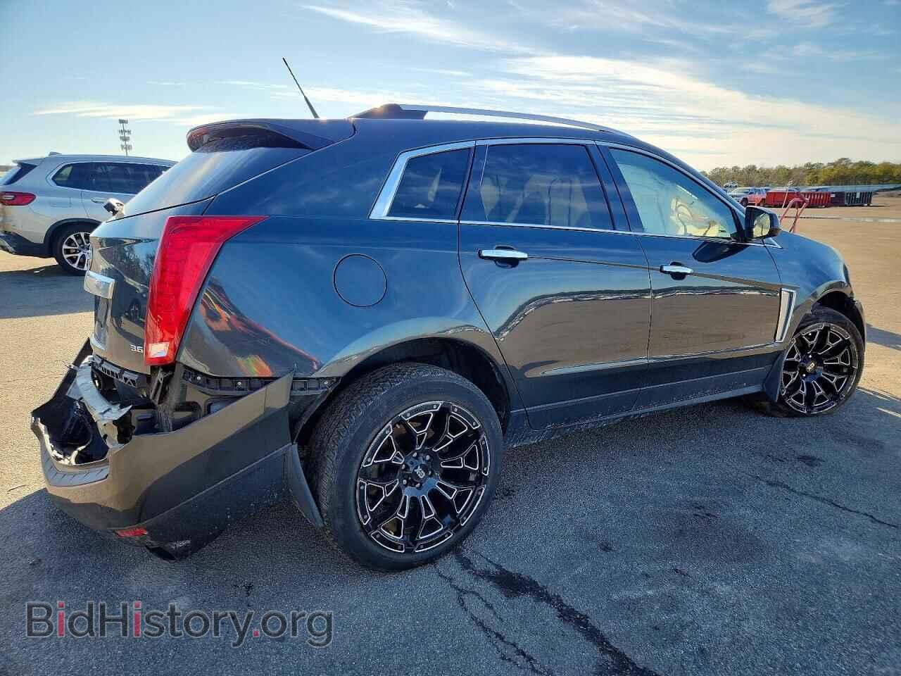2014 CADILLAC SRX - VIN: 3GYFNFE34ES627828 - Фото 3