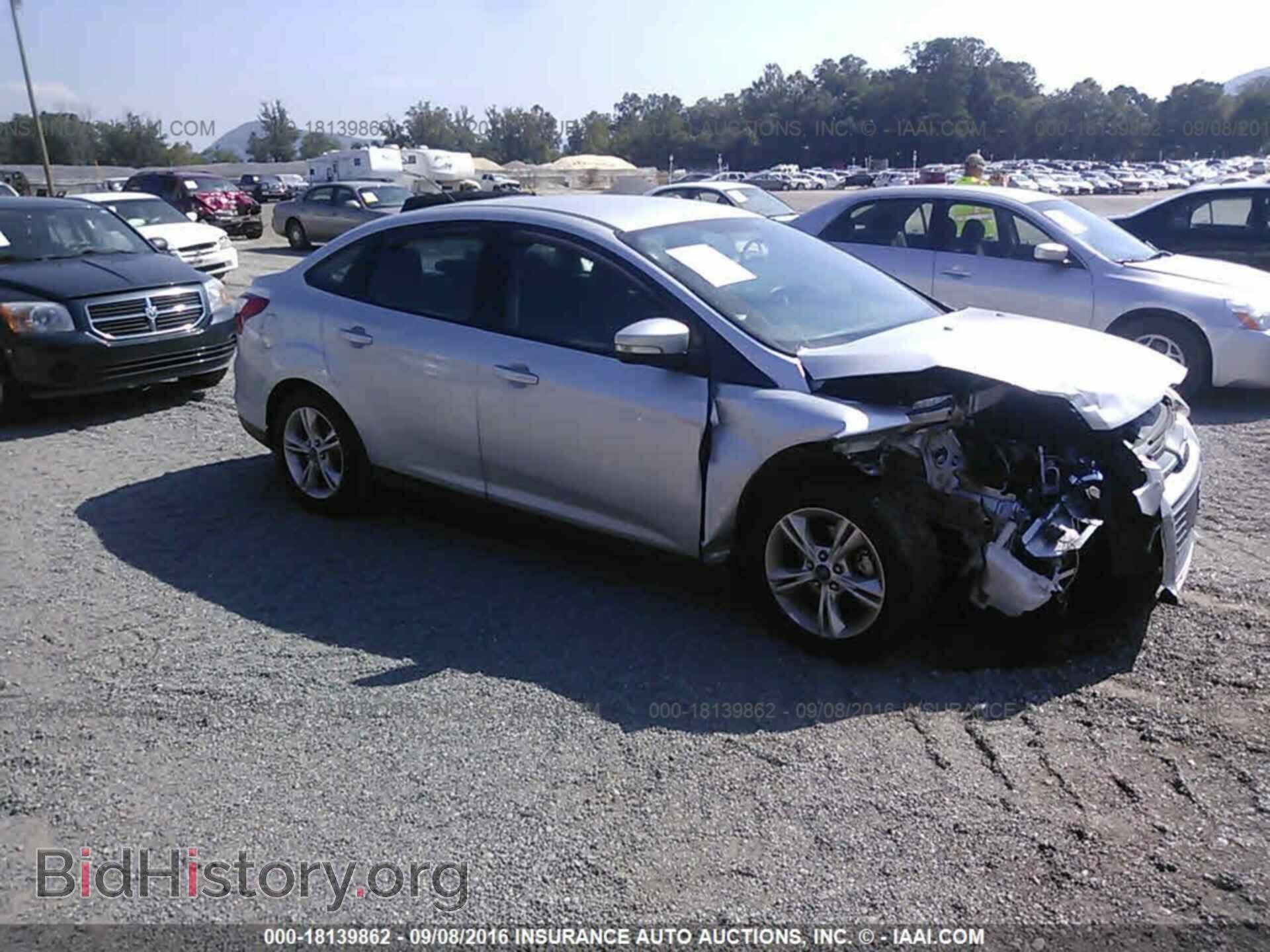 Photo 1FADP3F25EL179770 - Ford Focus 2014