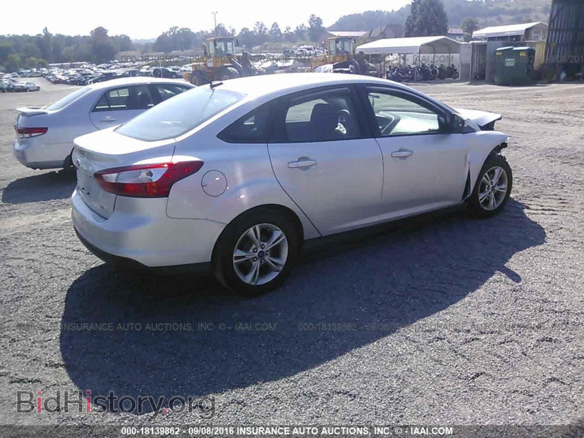 2014 Ford Focus - VIN: 1FADP3F25EL179770 - Photo 4