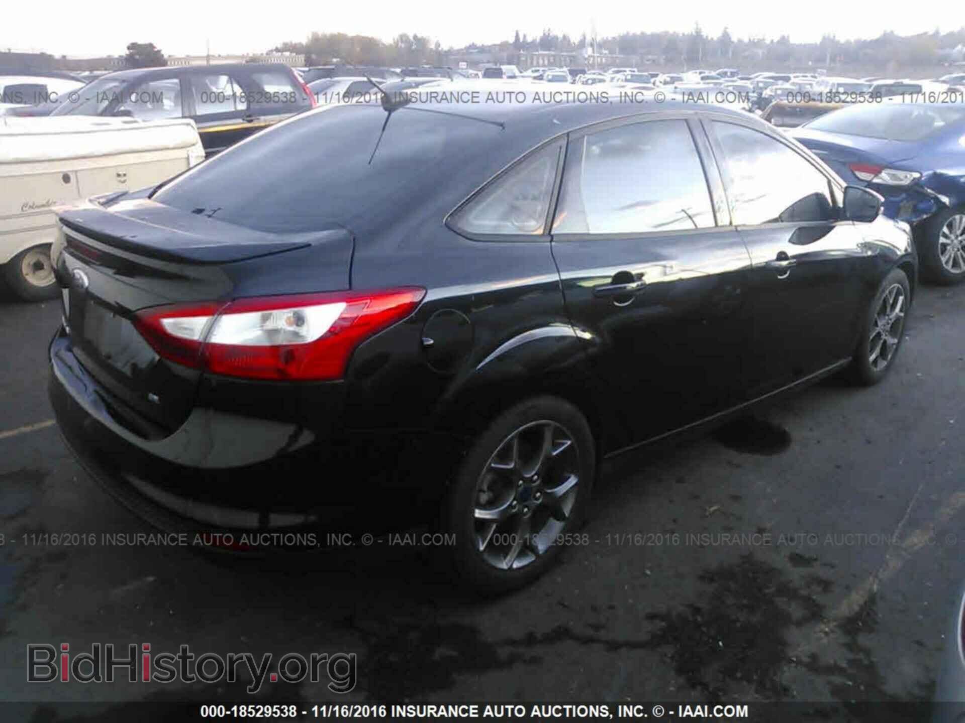 2014 Ford Focus - VIN: 1FADP3F21EL211257 - Фото 4