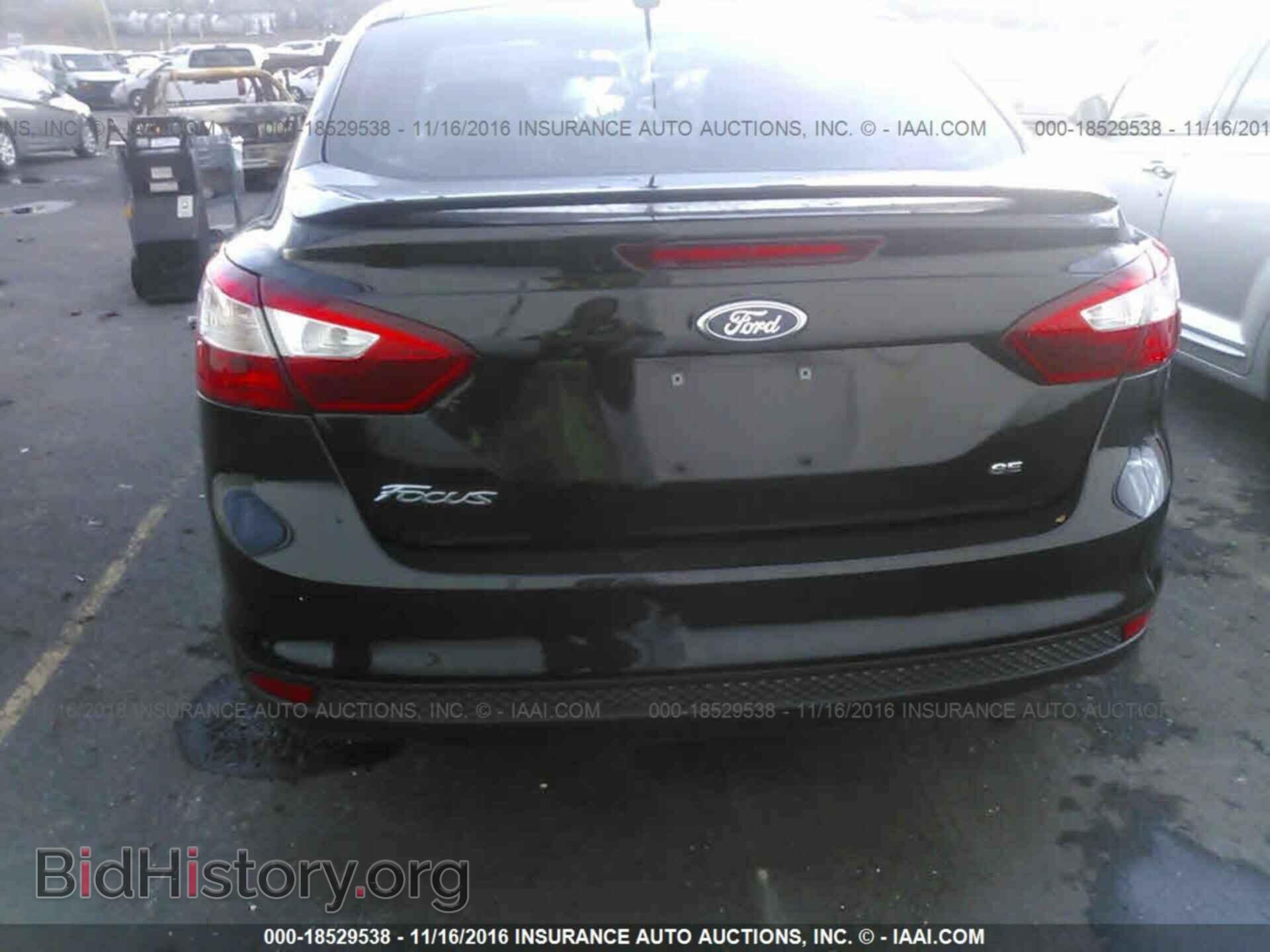 2014 Ford Focus - VIN: 1FADP3F21EL211257 - Фото 6