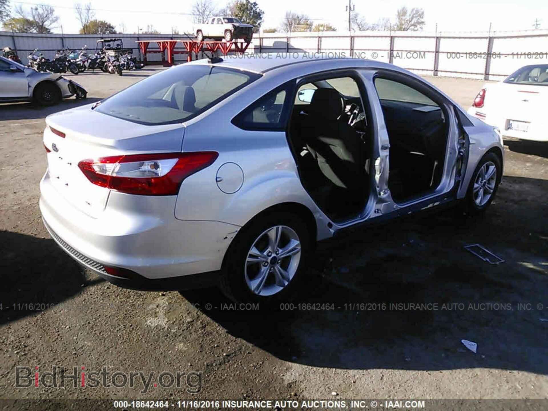 2014 Ford Focus - VIN: 1FADP3F22EL374676 - Фото 4