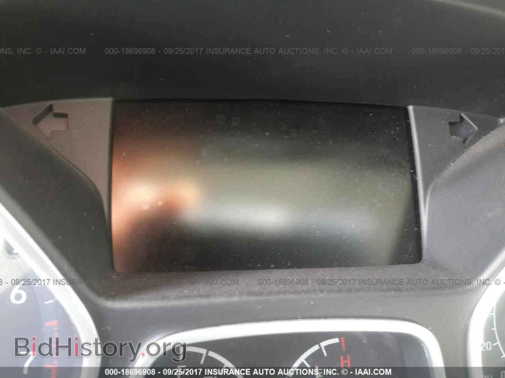 2015 Ford Focus - VIN: 1FADP3F24FL271275 - Photo 7