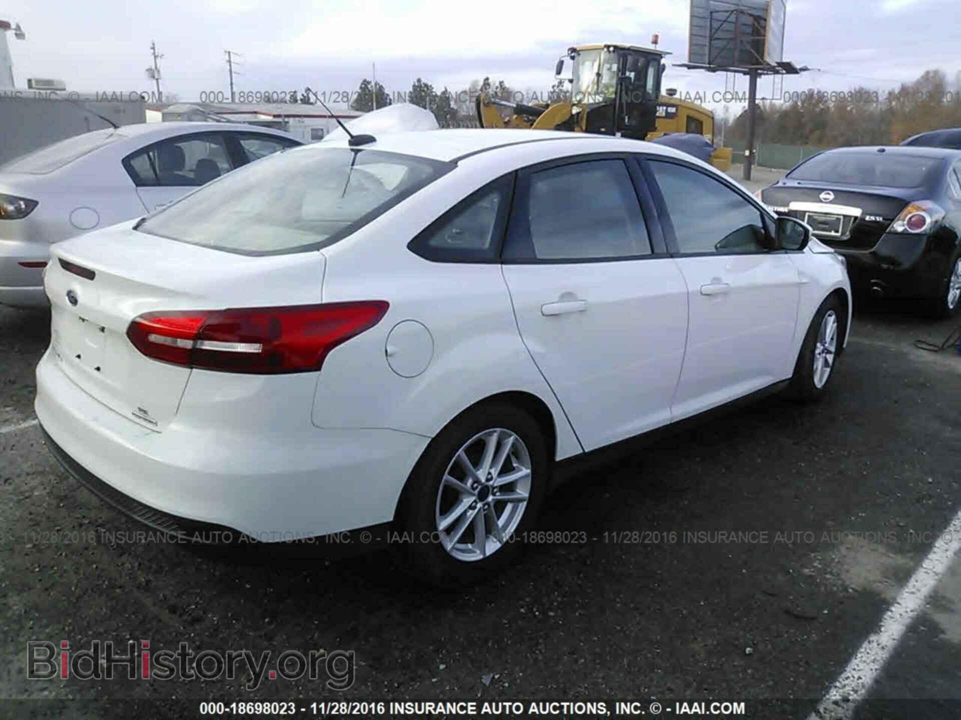 2016 Ford Focus - VIN: 1FADP3F20GL273915 - Photo 4