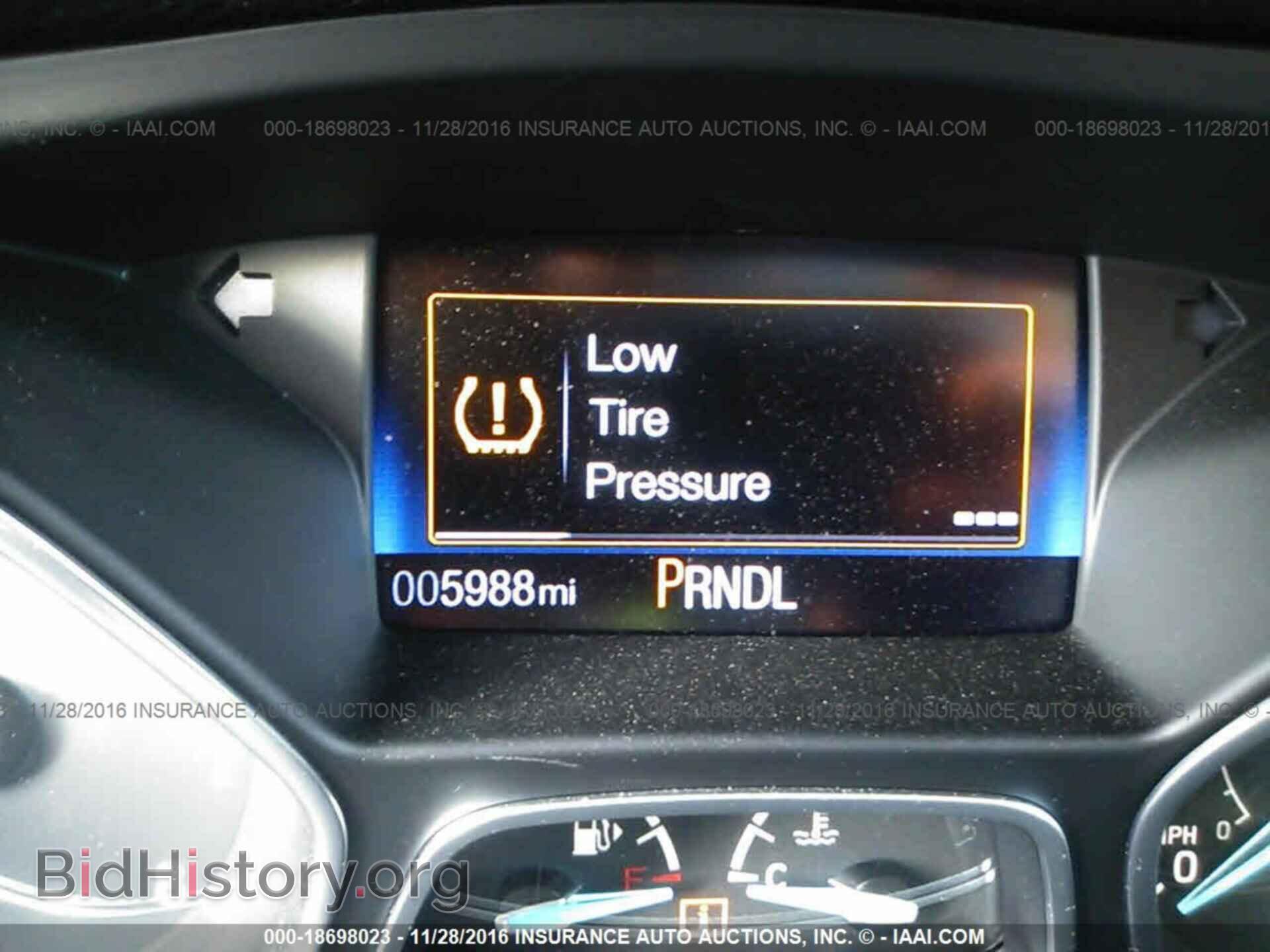 2016 Ford Focus - VIN: 1FADP3F20GL273915 - Photo 7