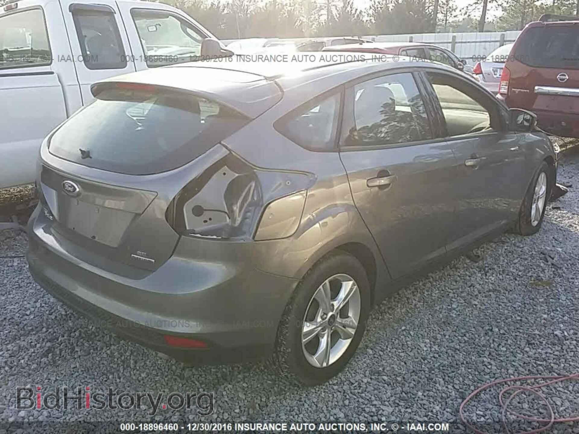 2014 Ford Focus - VIN: 1FADP3K29EL166090 - Фото 4