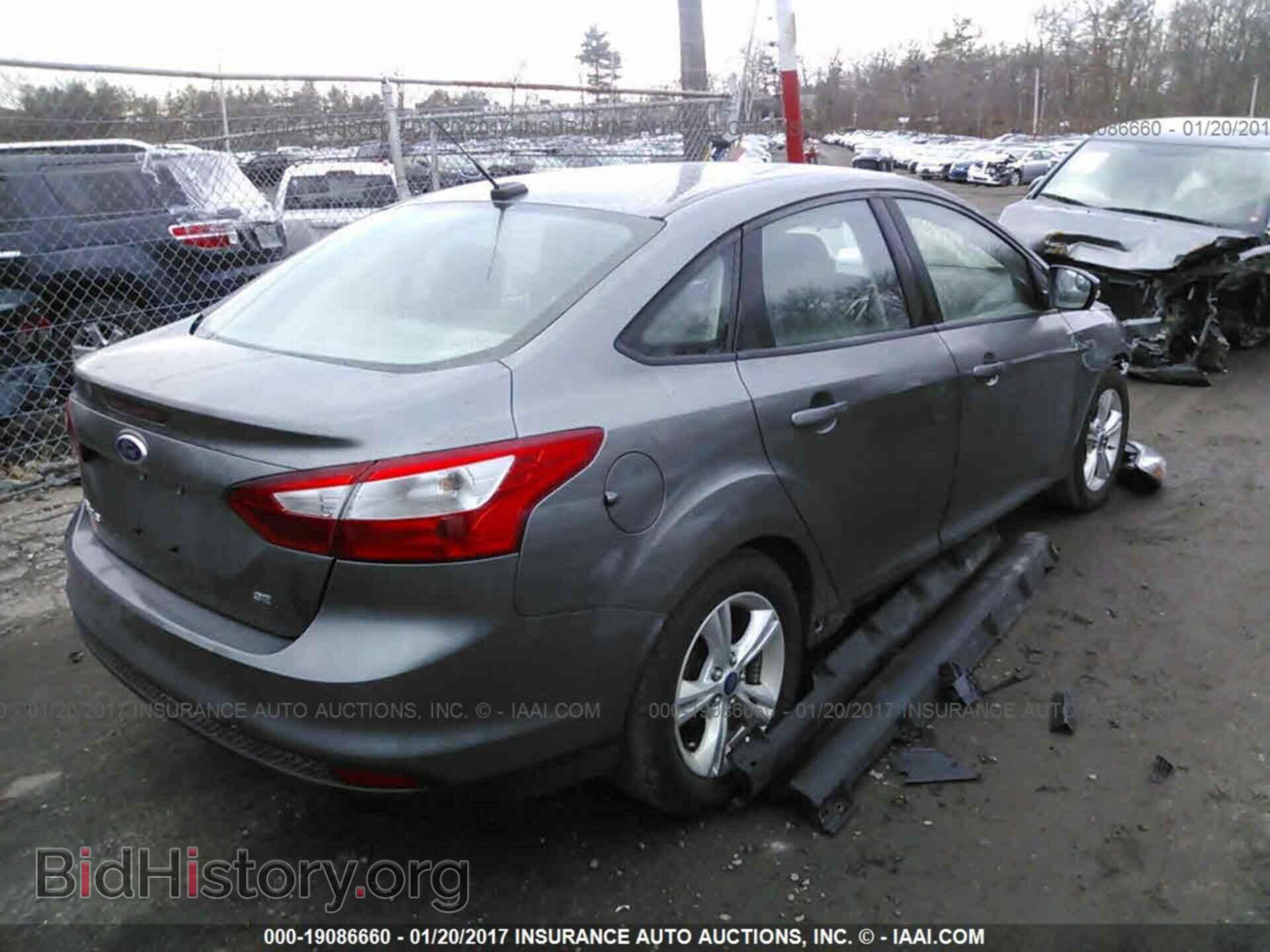 2014 Ford Focus - VIN: 1FADP3F25EL343938 - Photo 4