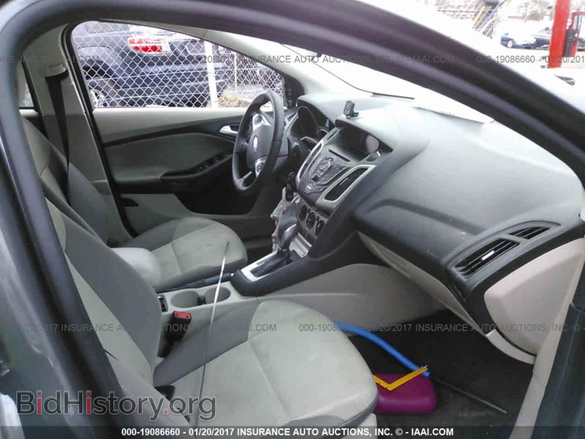 2014 Ford Focus - VIN: 1FADP3F25EL343938 - Photo 5