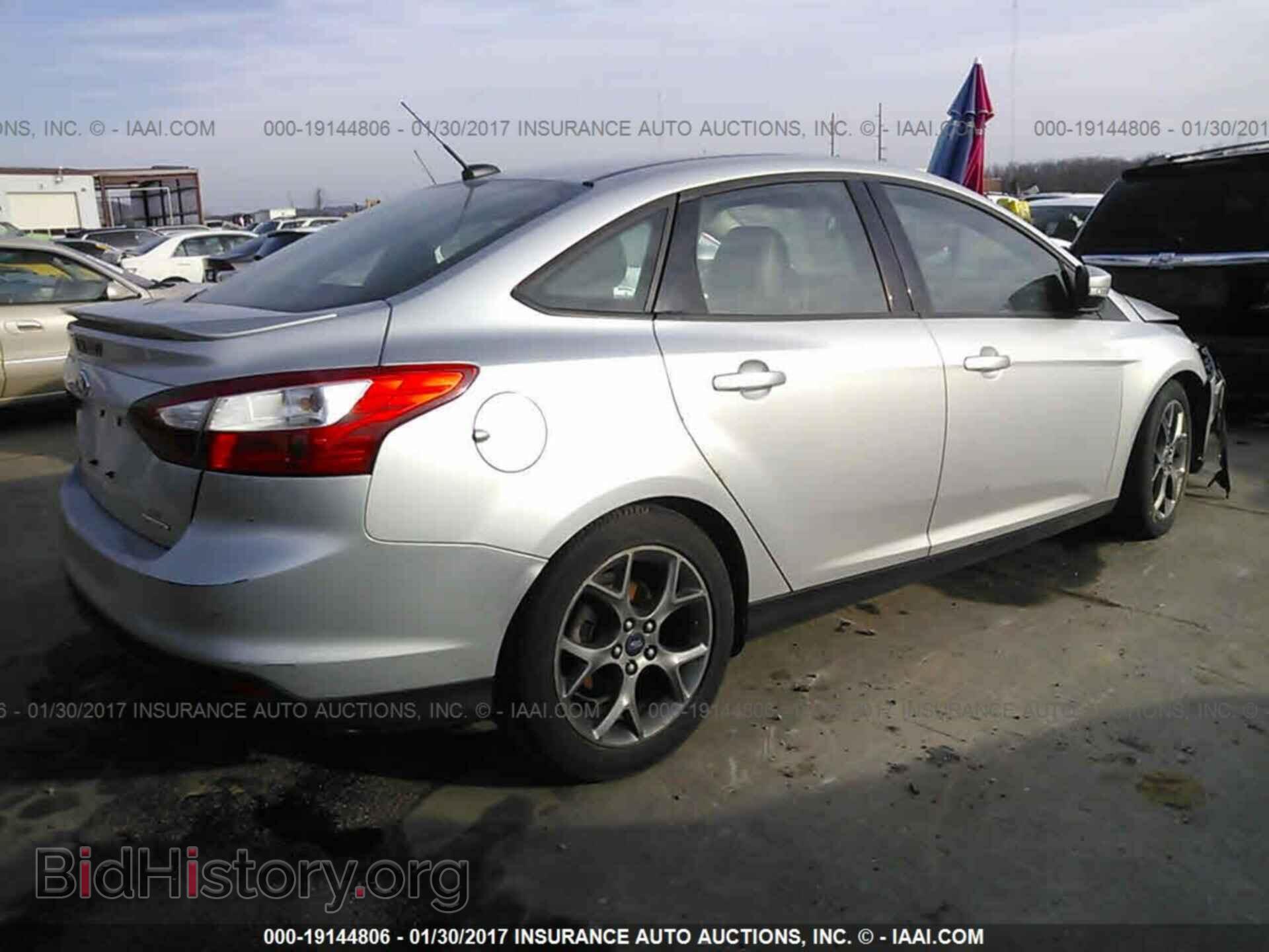 2014 Ford Focus - VIN: 1FADP3F21EL194640 - Photo 4