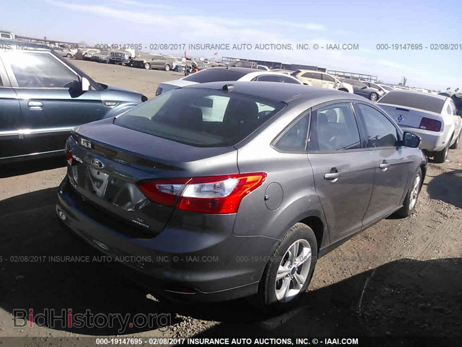 2014 Ford Focus - VIN: 1FADP3F25EL350176 - Фото 4